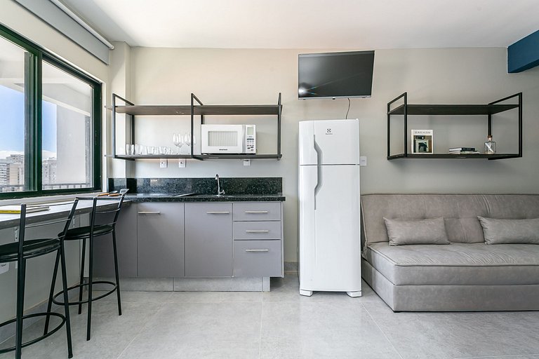 ap simples, mas completo, no coração da cidade